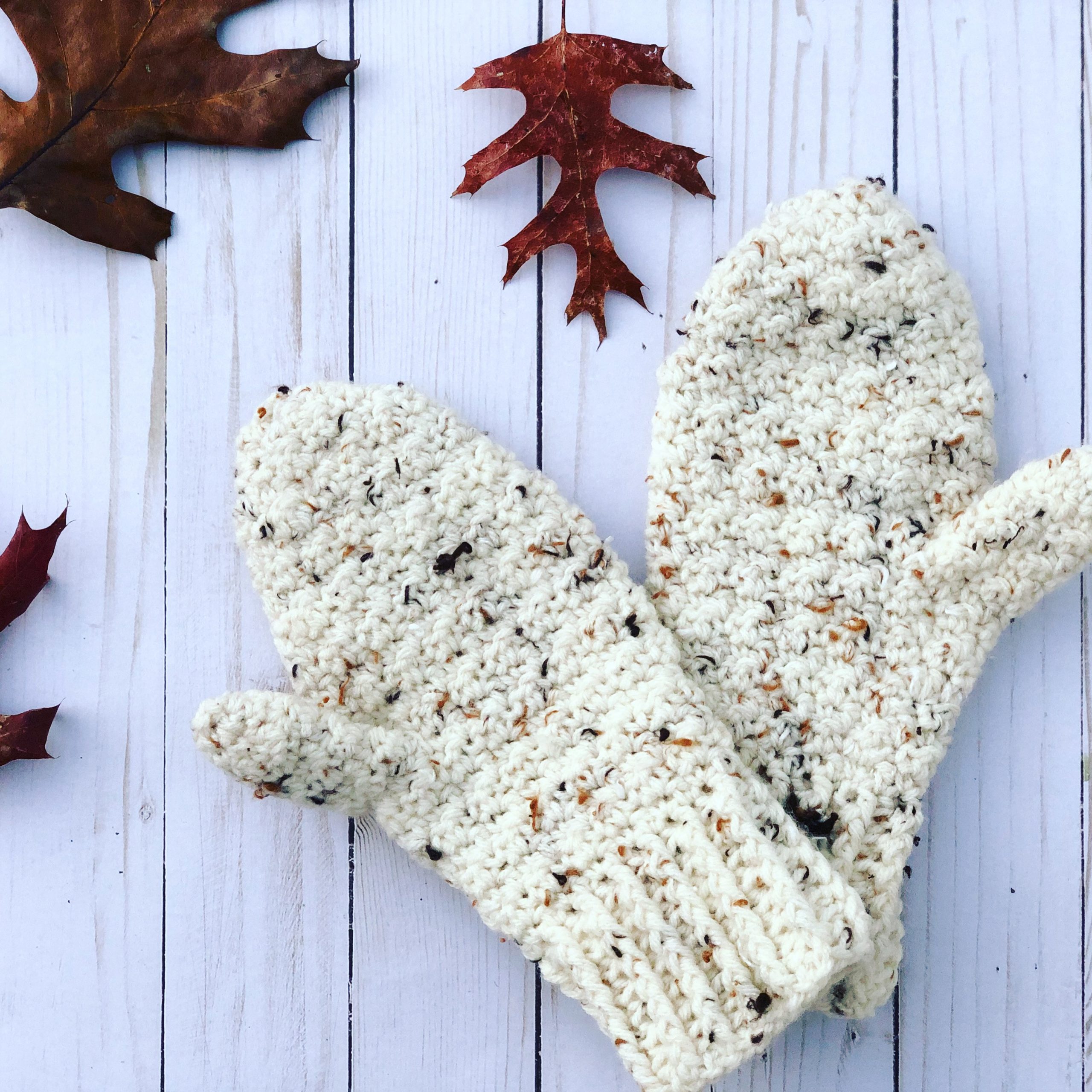 Lemon Peel Mittens, a crochet pattern for beginners. It's a quick one skein project.