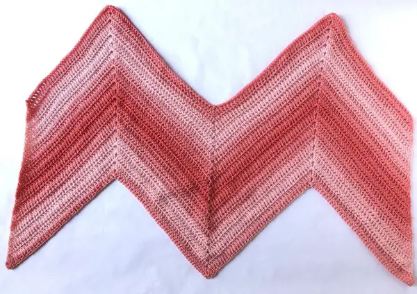 Sunrise Chevron Wrap, a crochet pattern made with just one skein of Red Heart Super Saver Ombre