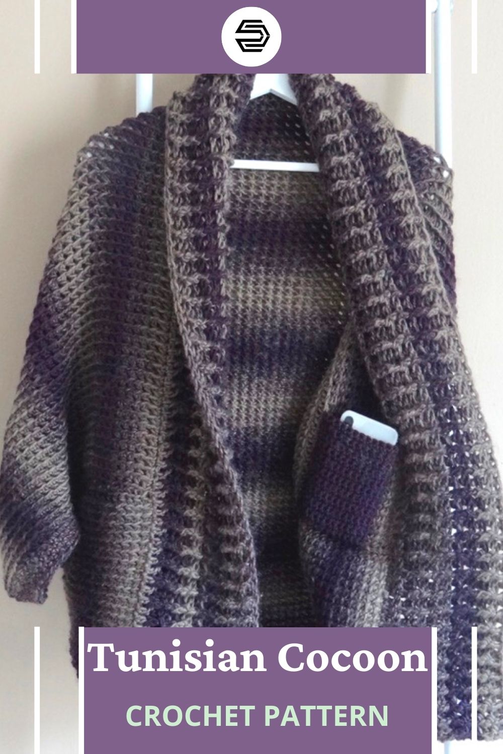 Learn how to make a tunisian half double crochet cocoon cardigan! As a size-inclusize pattern, everyone can create the perfect fit with the Abrazo Rayado Cocoon, a striped hug. Bonus, there's an inside pocket for holding your phone. 