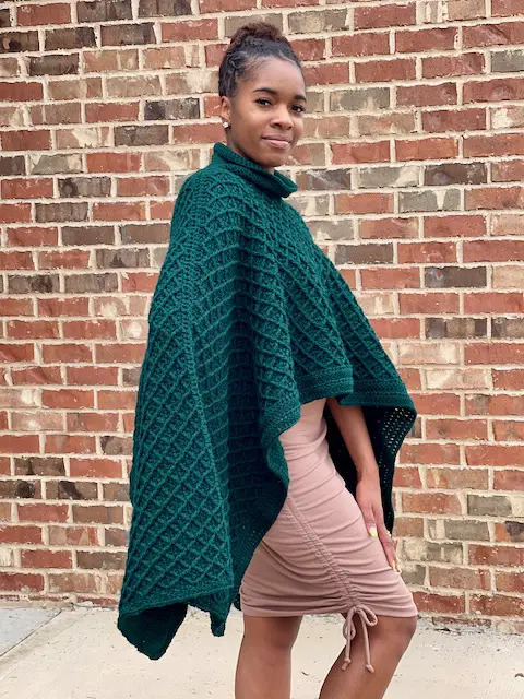 Draped in Diamonds Poncho features the diamond trellis stitch. This creates connected diamonds all over the front and back except at the seam and turtleneck.  It features a simple double crochet edging.