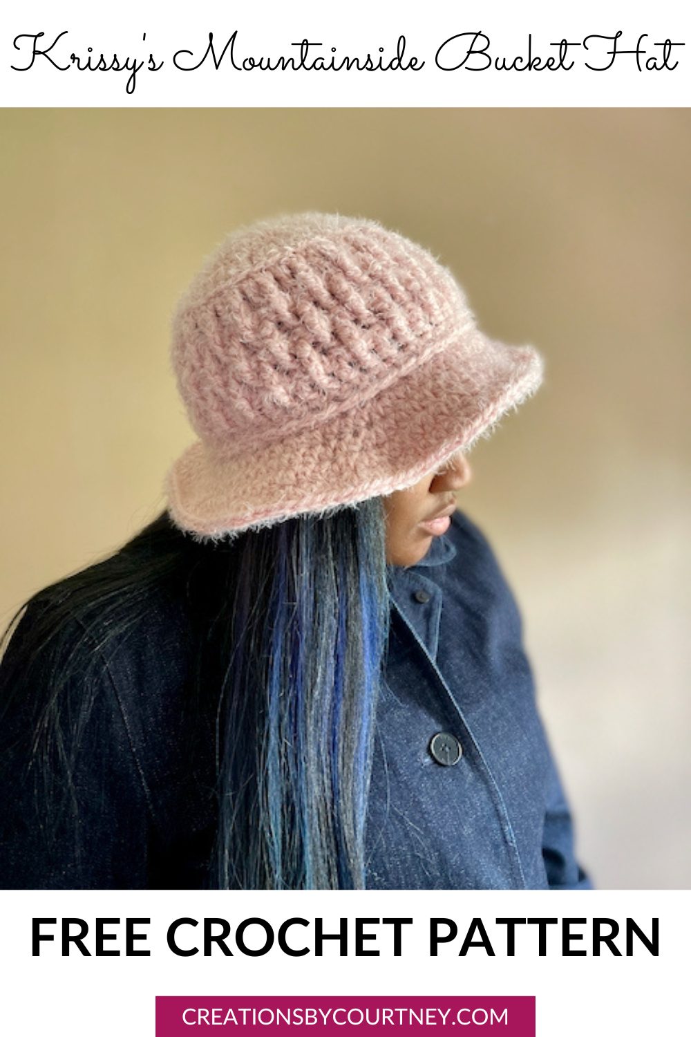 A picture of a woman with blue highlights in her black hair wearing a textured bucket crochet hat in a soft pink and fuzzy yarn.